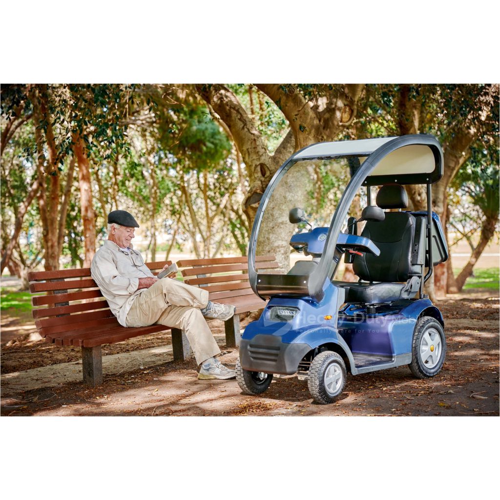 Lifestyle Image of Blue Afiscooter S4 with Canopy Mobility Scooter