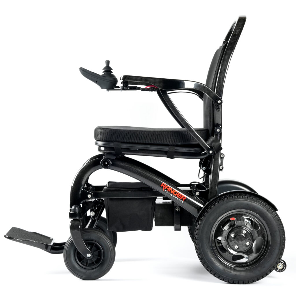 Porto Mobility Ranger TorqueLite folding power wheelchair, side view facing left